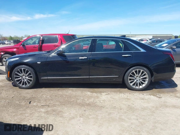 2017 Cadillac CT6 Luxury AWD z VIN 1G6KD5RS5HU133097, wystawiony jako IAAI lot #42144553 z przebiegiem 167 460 mil mil oraz . Historia ofert i sprzedaży dostępna na DreamBid. Obrazek 15.