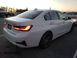 2019 BMW 3 Series 330i with VIN WBA5R1C53KFH24354, listed as a Copart auction lot 67731272 with 26,107 mi miles. Bid and sale history available at carsss.com. Image 3.