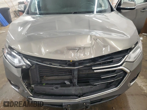 2018 Chevrolet Traverse LT z VIN 1GNEVHKW9JJ124245, wystawiony jako Copart lot #57029805 z przebiegiem 157 694 mil mil oraz Szkoda całkowita • Salvage title. Historia ofert i sprzedaży dostępna na DreamBid. Obrazek 12.