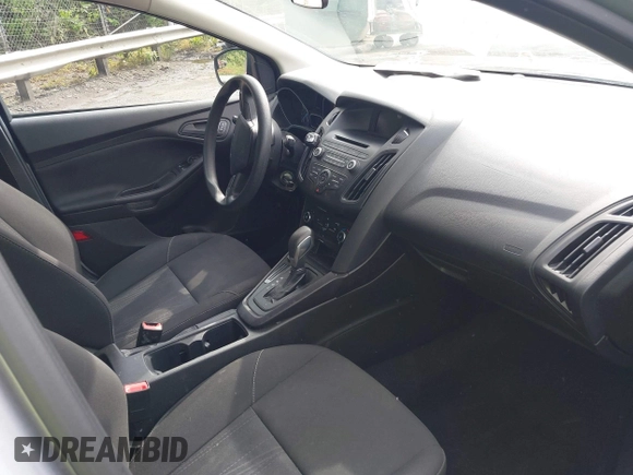 2017 Ford Focus S z VIN 1FADP3E21HL241557, wystawiony jako IAAI lot #42100036 z przebiegiem 106 764 mil mil oraz . Historia ofert i sprzedaży dostępna na DreamBid. Obrazek 5.