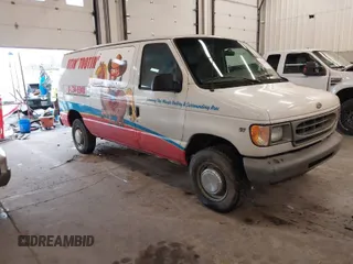 2000 Ford Econoline Cargo with VIN 1FTNE24L6YHB66463, listed as a IAAI auction lot 41611496 with 157,336 mi miles and . Bid and sale history available at DreamBid. Image 1.