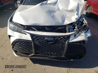 2020 Toyota Avalon Hybrid XSE z VIN 4T1E21FB6LU016405, wystawiony jako Copart lot #66490902 z przebiegiem 72 636 mil mil oraz . Historia ofert i sprzedaży dostępna na DreamBid. Obrazek 7.