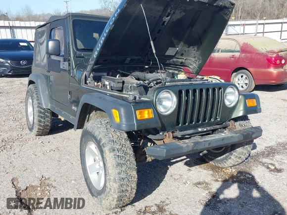 2006 Jeep Wrangler Rubicon z VIN 1J4FA69SX6P788424, wystawiony jako IAAI lot #41712349 z przebiegiem 121 684 mil mil oraz . Historia ofert i sprzedaży dostępna na DreamBid. Obrazek 12.