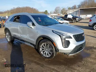 2022 Cadillac XT4 AWD Premium Luxury z VIN 1GYFZDR48NF134962, wystawiony jako IAAI lot #41823085 z przebiegiem 70 719 mil mil oraz . Historia ofert i sprzedaży dostępna na DreamBid. Obrazek 1.