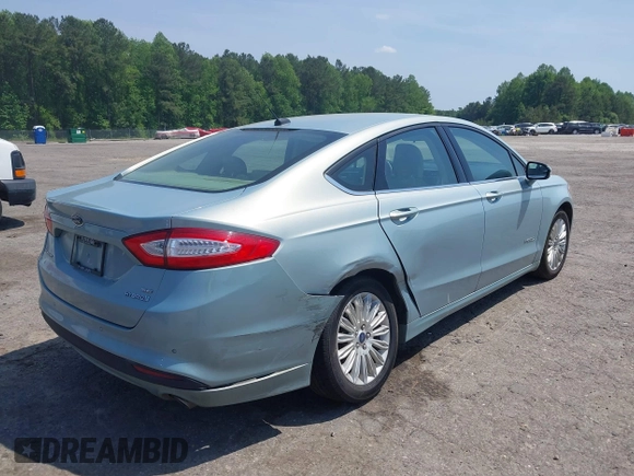 2014 Ford Fusion SE Hybrid with VIN 3FA6P0LU8ER251057, listed as a IAAI auction lot 42150589 with 188,192 mi miles and . Bid and sale history available at DreamBid. Image 4.