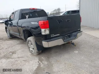 2012 Toyota Tundra 4WD Truck with VIN 5TFUM5F18CX028952, listed as a IAAI auction lot 41497110 with 242,526 mi miles. Bid and sale history available at carsss.com. Image 3.