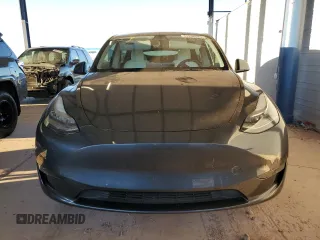 2021 Tesla Model Y Long Range with VIN 5YJYGDEEXMF151557, listed as a Copart auction lot 54936885 with 106,411 mi miles and Salvage Title. Bid and sale history available at DreamBid. Image 5.