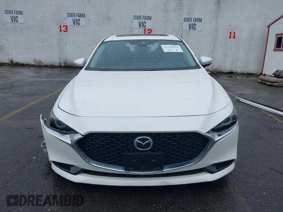 2020 Mazda 3 Premium with VIN 3MZBPBEMXLM133357, listed as a IAAI auction lot 41540234 with 81,280 mi miles and . Bid and sale history available at DreamBid. Image 13.