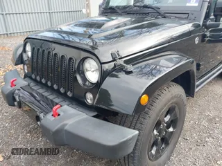 2015 Jeep Wrangler Unlimited Sahara with VIN 1C4HJWEG0FL661723, listed as a IAAI auction lot 41998393 with 89,077 mi miles. Bid and sale history available at carsss.com. Image 6.
