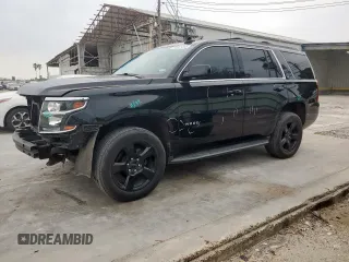 2020 Chevrolet Tahoe LT с VIN 1GNSCBKC5LR203301, выставлен на аукционе Copart как лот 57071315 с пробегом 106 376 миль миль и Списание • Salvage title. История ставок и продаж доступна на DreamBid. Изображение 1.