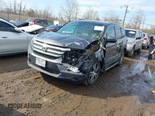 2017 Honda Pilot EX-L with VIN 5FNYF5H53HB029780, listed as a IAAI auction lot 41667838 with 104,803 mi miles. Bid and sale history available at carsss.com. Image 17.