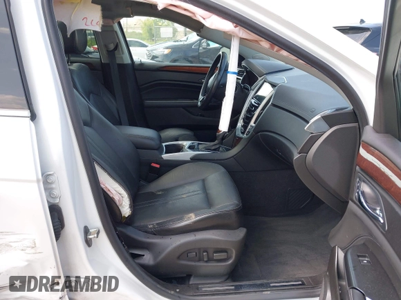 2013 Cadillac SRX Performance Collection with VIN 3GYFNHE3XDS520177, listed as a IAAI auction lot 42536457 with 217,963 mi miles and . Bid and sale history available at DreamBid. Image 5.