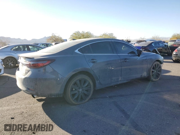 2021 Mazda 6 Carbon Edition with VIN JM1GL1WY0M1610974, listed as a Copart auction lot 84961604 with 55,107 mi miles and Salvage Title. Bid and sale history available at DreamBid. Image 3.