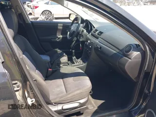 2007 Mazda 3 s Touring with VIN JM1BK323571631973, listed as a IAAI auction lot 41990310 with 287,946 mi miles. Bid and sale history available at carsss.com. Image 5.