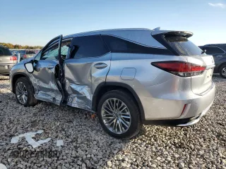 2022 Lexus RX with VIN JTJJGKFA2N2027883, listed as a Copart auction lot 75812744 with 21,664 mi miles and Salvage Title. Bid and sale history available at carsss.com. Image 2.