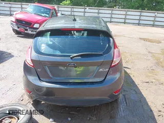 2019 Ford Fiesta SE z VIN 3FADP4EJ9KM125252, wystawiony jako IAAI lot #42221622 z przebiegiem 57 366 mil mil oraz . Historia ofert i sprzedaży dostępna na DreamBid. Obrazek 17.