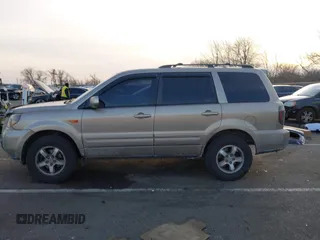 2007 Honda Pilot EX-L with VIN 2HKYF18667H509331, listed as a IAAI auction lot 41453510 with 228,746 mi miles and . Bid and sale history available at DreamBid. Image 14.
