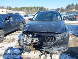 2020 Mazda CX-5 Grand Touring with VIN JM3KFBDM7L1807685, listed as a IAAI auction lot 41392313 with 91,729 mi miles and . Bid and sale history available at carsss.com. Image 12.