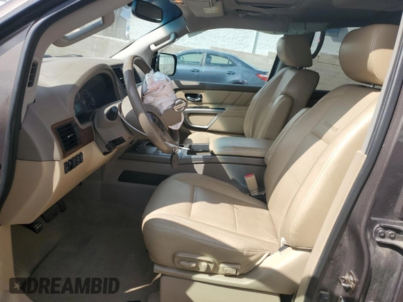 2015 Nissan Armada Platinum z VIN 5N1AA0NC6FN602610, wystawiony jako Copart lot #69121314 z przebiegiem 117 166 mil mil oraz Szkoda całkowita • Salvage title. Historia ofert i sprzedaży dostępna na DreamBid. Obrazek 7.