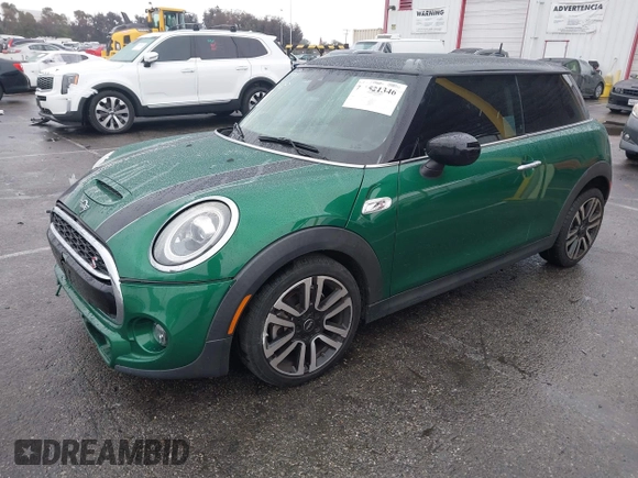 2020 MINI Hardtop Cooper S z VIN WMWXR5C08L2L85651, wystawiony jako IAAI lot #41521346 z przebiegiem 40 863 mil mil oraz . Historia ofert i sprzedaży dostępna na DreamBid. Obrazek 18.