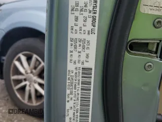 2013 Dodge Journey SXT with VIN 3C4PDCBG0DT619382, listed as a Copart auction lot 56565205 with 176,112 mi miles and Salvage title. Bid and sale history available at DreamBid. Image 13.