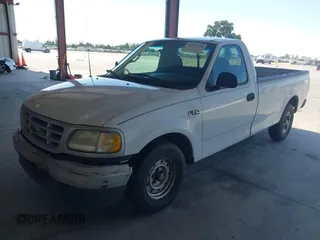 1999 Ford F-150 with VIN 1FTZF1721XKB63483, listed as a IAAI auction lot 42327278 with Not provided miles and . Bid and sale history available at DreamBid. Image 2.