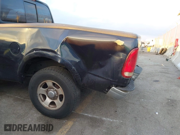 1999 Ford F-150 XL with VIN 1FTRX17L3XKB32547, listed as a IAAI auction lot 41331882 with Not Provided miles. Bid and sale history available at carsss.com. Image 6.
