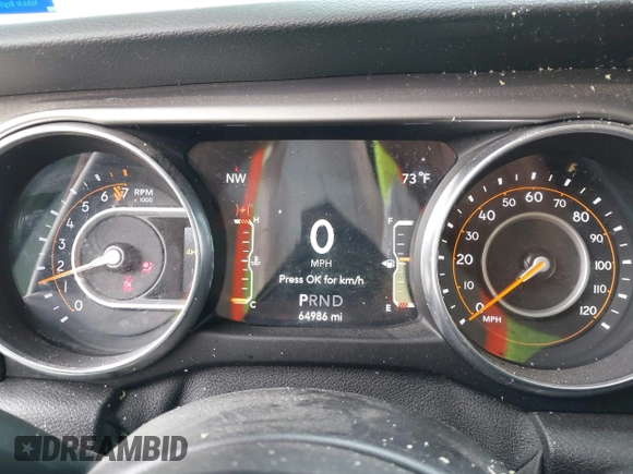 2020 Jeep Wrangler Sport S with VIN 1C4GJXAG1LW103235, listed as a IAAI auction lot 42126250 with 64,986 mi miles and . Bid and sale history available at DreamBid. Image 7.
