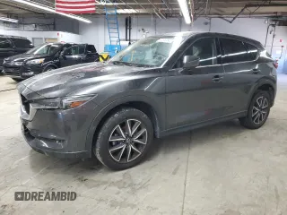 2018 Mazda CX-5 Grand Touring with VIN JM3KFBDM0J0402500, listed as a Copart auction lot 53350845 with 53,610 mi miles and Salvage title. Bid and sale history available at DreamBid. Image 1.