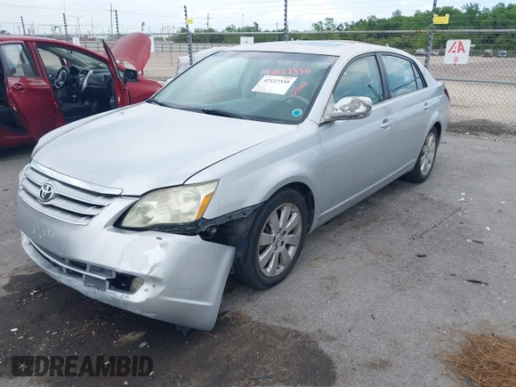 2007 Toyota Avalon XL with VIN 4T1BK36B47U191188, listed as a IAAI auction lot 42127335 with 213,701 mi miles. Bid and sale history available at carsss.com. Image 2.