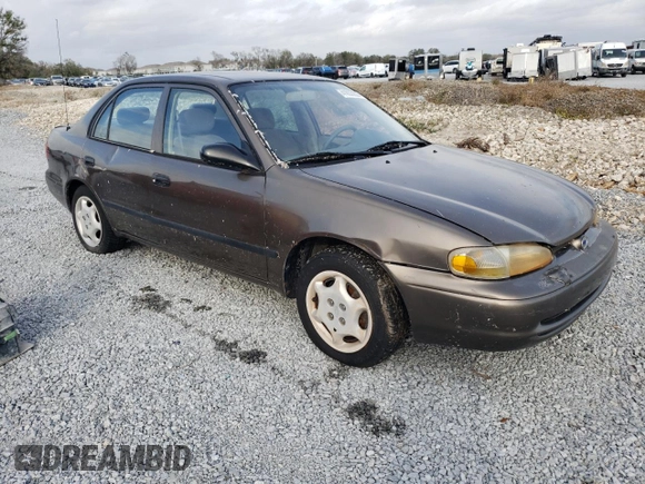 2000 Chevrolet Prizm z VIN 1Y1SK5280YZ405636, wystawiony jako Copart lot #41633235 z przebiegiem Nie podano mil oraz Nie do naprawy • Non repairable. Historia ofert i sprzedaży dostępna na DreamBid. Obrazek 4.