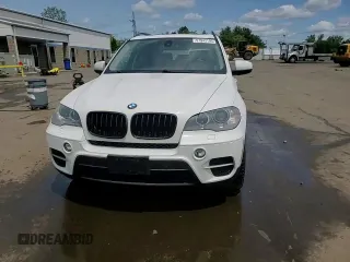 2012 BMW X5 35i with VIN 5UXZV4C54CL763857, listed as a Copart auction lot 57943195 with 143,522 mi miles and Salvage title. Bid and sale history available at DreamBid. Image 14.