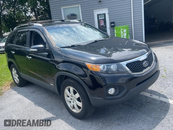 2013 Kia Sorento LX with VIN 5XYKTCA65DG324775, listed as a Copart auction lot 63433705 with 128,031 mi miles and Clean title. Bid and sale history available at DreamBid. Image 1.