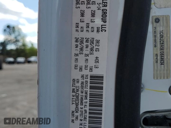 2014 Jeep Compass Sport with VIN 1C4NJCBA5ED844934, listed as a Copart auction lot 52774945 with 148,897 mi miles and Salvage Title. Bid and sale history available at carsss.com. Image 15.