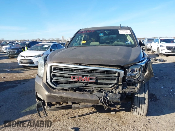 2015 GMC Yukon SLE with VIN 1GKS1AKCXFR712897, listed as a IAAI auction lot 41357889 with 1 mi miles. Bid and sale history available at carsss.com. Image 6.