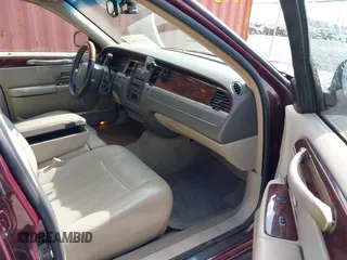 2006 Lincoln Town Car Signature z VIN 1LNHM81V06Y649934, wystawiony jako IAAI lot #42143662 z przebiegiem 147 534 mil mil oraz . Historia ofert i sprzedaży dostępna na DreamBid. Obrazek 5.