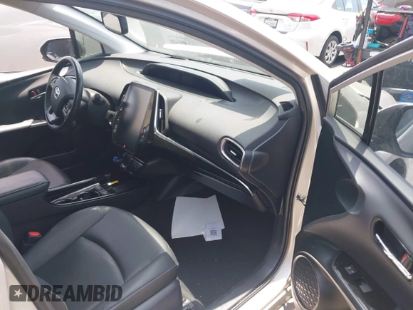 2021 Toyota Prius LE with VIN JTDKAMFP5M3167430, listed as a IAAI auction lot 42462853 with 70,492 mi miles and . Bid and sale history available at DreamBid. Image 5.