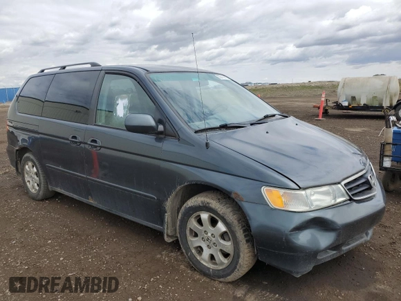 2003 Honda Odyssey EX with VIN 2HKRL18603H008412, listed as a Copart auction lot 55310905 with 352,774 mi miles and Salvage Title. Bid and sale history available at DreamBid. Image 4.