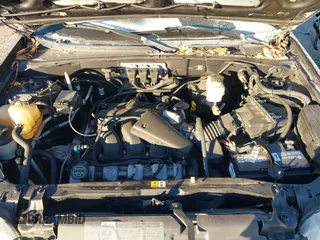 2005 Ford Escape Limited with VIN 1FMCU94115KB85496, listed as a IAAI auction lot 41384428 with 158,852 mi miles and . Bid and sale history available at DreamBid. Image 10.