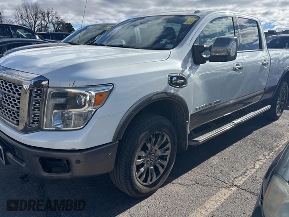 2016 Nissan Titan XD PRO-4X with VIN 1N6BA1F40GN515810, listed as a Copart auction lot 87436204 with 210,650 mi miles and Clean Title. Bid and sale history available at carsss.com. Image 2.