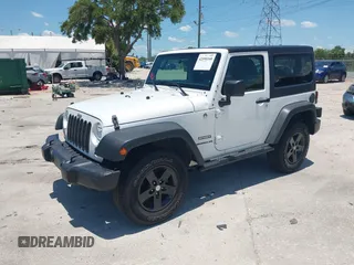 2013 Jeep Wrangler Sport with VIN 1C4AJWAG0DL542624, listed as a IAAI auction lot 42590160 with 54,850 mi miles and . Bid and sale history available at DreamBid. Image 17.