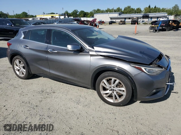 2018 Infiniti QX30 Luxury with VIN SJKCH5CP3JA060276, listed as a Copart auction lot 52947805 with 73,401 mi miles and Salvage title. Bid and sale history available at DreamBid. Image 4.