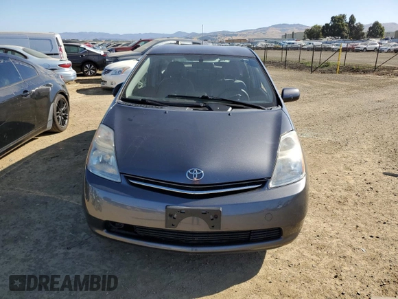 2007 Toyota Prius z VIN JTDKB20U573288978, wystawiony jako Copart lot #57469155 z przebiegiem 170 422 mil mil oraz Szkoda całkowita • Salvage title. Historia ofert i sprzedaży dostępna na DreamBid. Obrazek 5.
