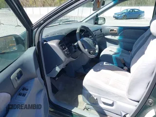 2000 Toyota Sienna LE with VIN 4T3ZF13C1YU291486, listed as a IAAI auction lot 41920881 with 192,607 mi miles. Bid and sale history available at carsss.com. Image 5.