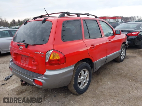 2004 Hyundai Santa Fe GLS with VIN KM8SC13D24U724643, listed as a IAAI auction lot 41908475 with 82,656 mi miles. Bid and sale history available at carsss.com. Image 4.