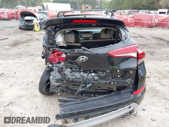 2017 Hyundai Tucson Value z VIN KM8J33A29HU369601, wystawiony jako IAAI lot #41947376 z przebiegiem 140 000 mil mil oraz . Historia ofert i sprzedaży dostępna na DreamBid. Obrazek 17.
