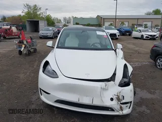 2024 Tesla Model Y Long Range with VIN 7SAYGAEE2RF014315, listed as a IAAI auction lot 42053183 with 36,521 mi miles and . Bid and sale history available at carsss.com. Image 12.