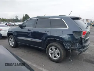 2013 Jeep Grand Cherokee Laredo with VIN 1C4RJEAGXDC620968, listed as a IAAI auction lot 41425270 with 127,739 mi miles. Bid and sale history available at carsss.com. Image 14.