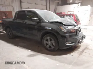 2023 Honda Ridgeline RTL z VIN 5FPYK3F56PB039132, wystawiony jako IAAI lot #41450776 z przebiegiem 29 392 mil mil oraz . Historia ofert i sprzedaży dostępna na DreamBid. Obrazek 1.