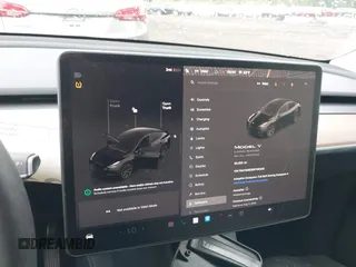 2024 Tesla Model Y Long Range z VIN 7SAYGDEE5RF130335, wystawiony jako IAAI lot #42250979 z przebiegiem 20 300 mil mil oraz . Historia ofert i sprzedaży dostępna na DreamBid. Obrazek 17.